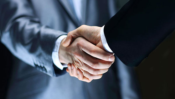 Real estate investments handshake